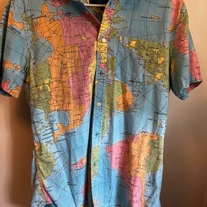 World map button shirt